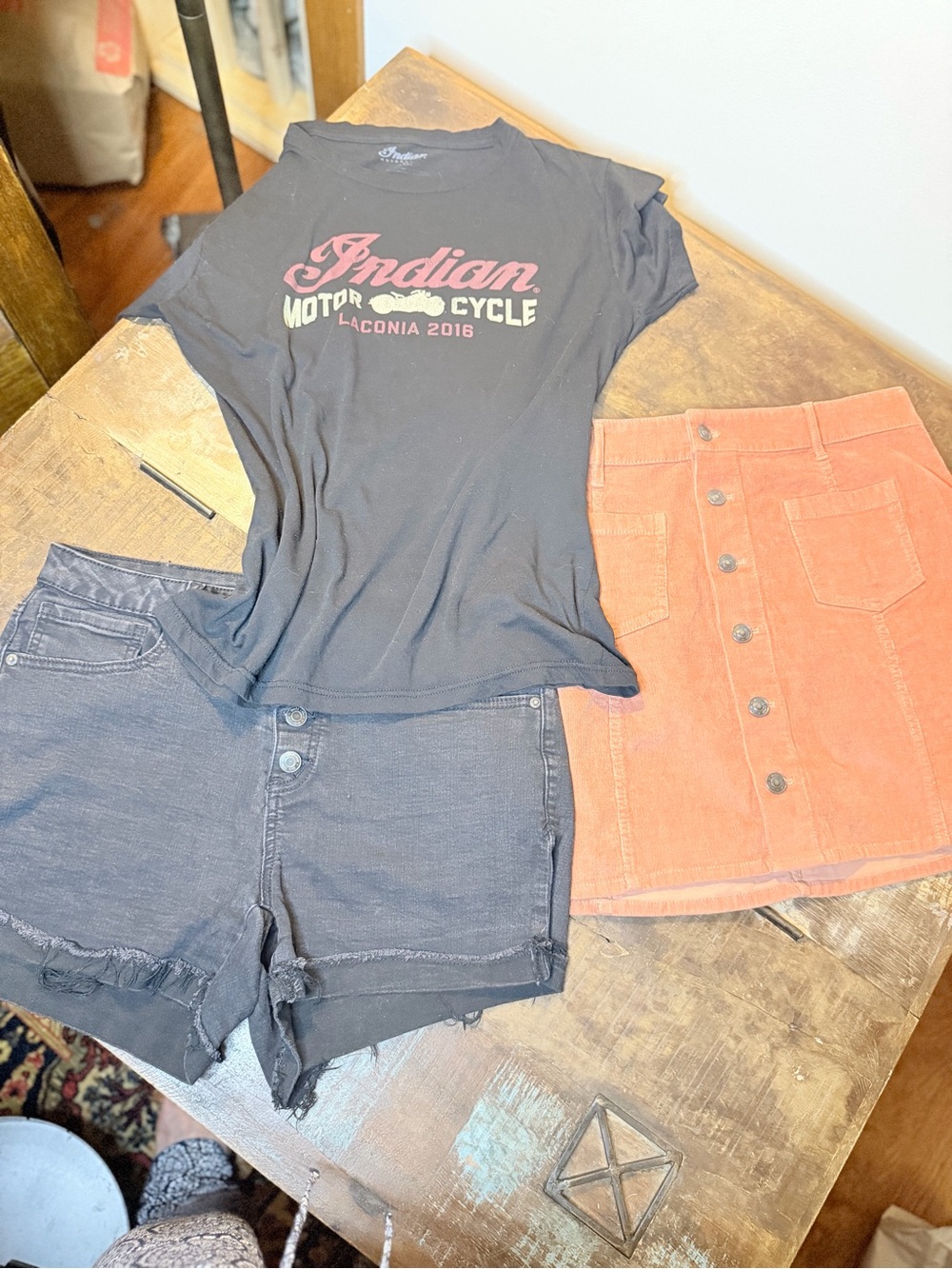 Outfit-Indian Laconia Black Tee, Jeans Cutoff Shorts, Rust Corduroy Mini Skirt